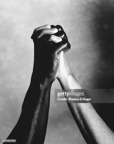 Men And Woman Interlocking Hands Fotografías e imágenes de stock ...
