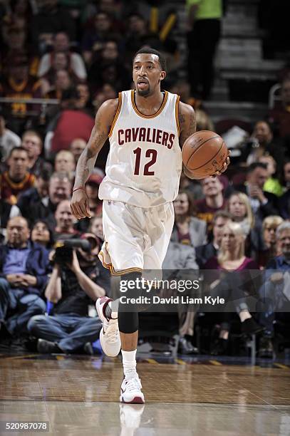 Jordan McRae of the Cleveland Cavaliers brings the ball up court against the Detroit Pistons on April 13, 2016 at Quicken Loans Arena in Cleveland,...
