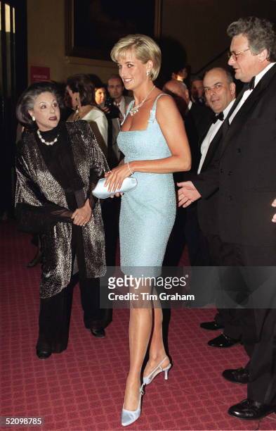 Diana, Princess Of Wales With Lady Pamela Harlech Attends The Royal Gala Performance Of'swan Lake' At The Royal Albert Hall Wearing Dress By Fashion...
