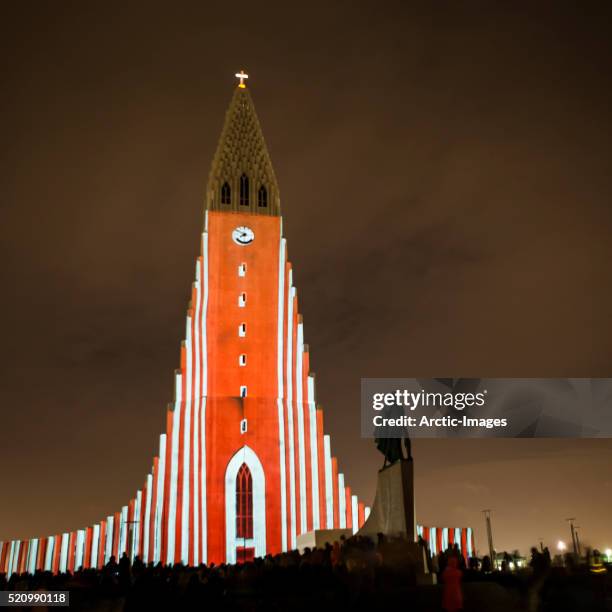 laser light show on hallgrimskirkja church, reykjavik, iceland - reykjavik winter stock pictures, royalty-free photos & images