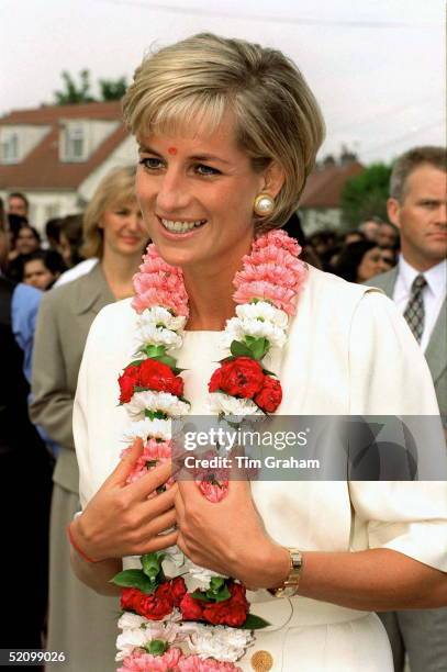 Diana Princess Of Wales Has Been Presented With A Floral Garland Whilst Visiting The Shri Swaminarayan Mandir In Neasden, London Nw10. Her...