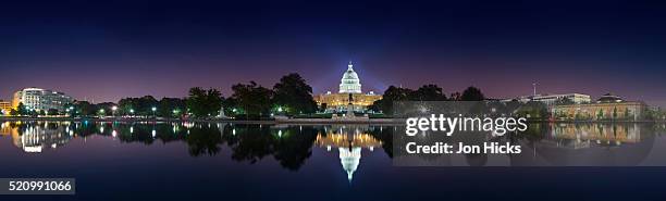the us capitol and reflecting pool. - capitol hill stock pictures, royalty-free photos & images