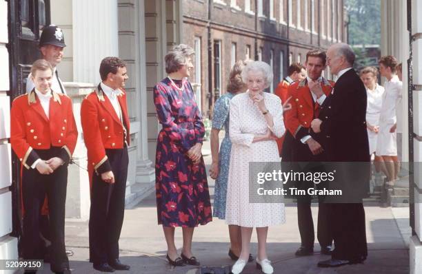 Lady Ruth Fermoy And Other Members Of The Queen Mothers Staff Outside Clarence House.