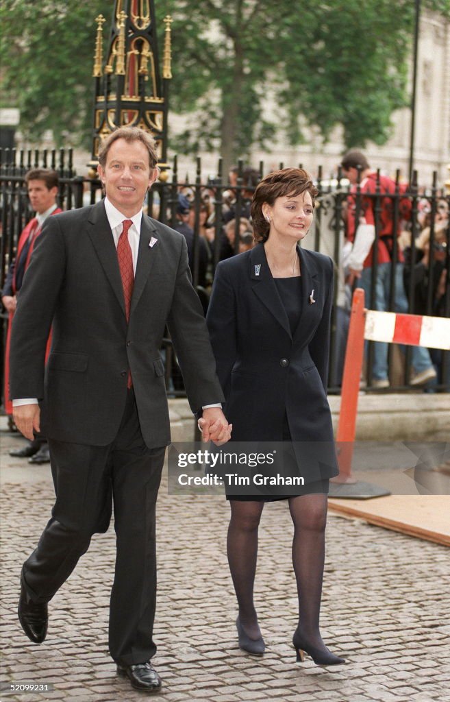 Prime Minister Tony Holding Hands With His Wife, Cherie Blair, As