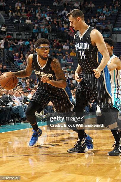 Devyn Marble of the Orlando Magic drives against the Charlotte Hornets during the game at the Time Warner Cable Arena on April 13, 2016 in Charlotte,...