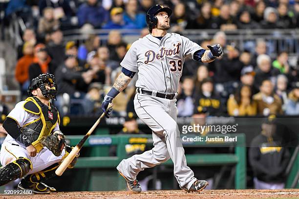 Jarrod Saltalamacchia of the Detroit Tigers hits a grand slam home run in the sixth inning during the game against the Pittsburgh Pirates at PNC Park...
