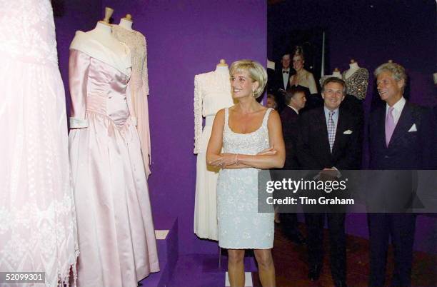 Diana, Princess Of Wales, With Christopher Balfour And Lord Hindlip At A Private Viewing And Reception At Christies Of The Dresses For Auction In Aid...