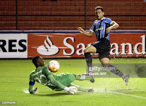 Brazil's Gremio player Bobo shoots to score against Ecuador´s Liga Deportiva Univesitaria de Quito, during the Libertadores Cup football match at...