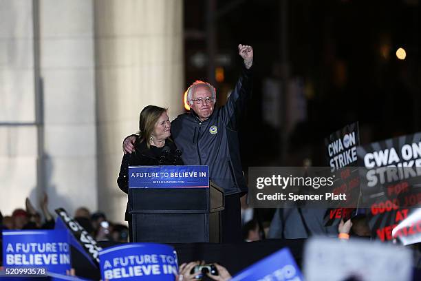 Democratic Presidential candidate Bernie Sanders stands on stage with his wife Jane O'Meara Sanders before speaking to thousands of people at a rally...