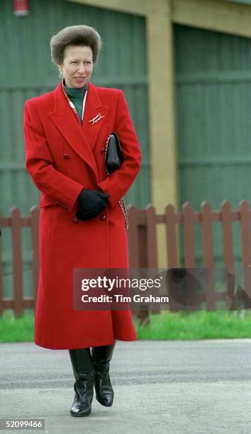 Princess Anne Visiting Marwell Zoological Park, Winchester, Hampshire. The Princess Is Wearing A Red Coat And Black Boots.