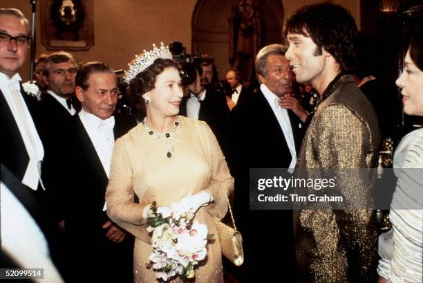 The Queen Sharing A Joke With Singer Cliff Richard After Watching Him Perform At The Royal Variety Show In London.