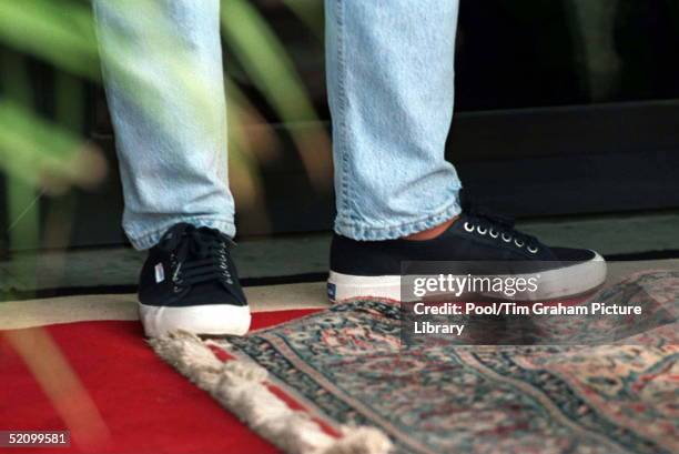 Princess Diana In Angola Wearing Denim Jeans And Trainers