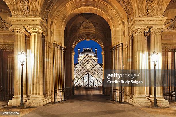 louvre museum at twilight - pyramide du louvre stock pictures, royalty-free photos & images