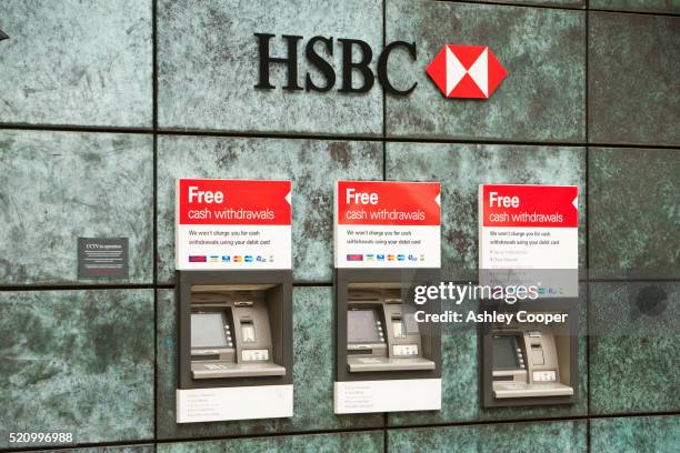 hsbc atm's in london, uk. - hsbc stock pictures, royalty-free photos & images