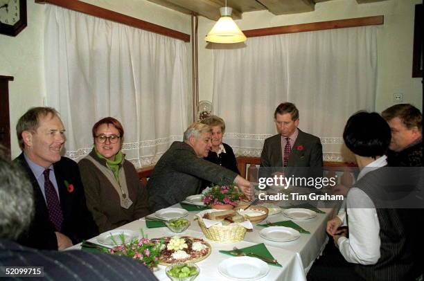 Prince Charles And President Milan Kucan Of Slovenia Sample Some Local Food At Pozrv Farm, Slovenia.