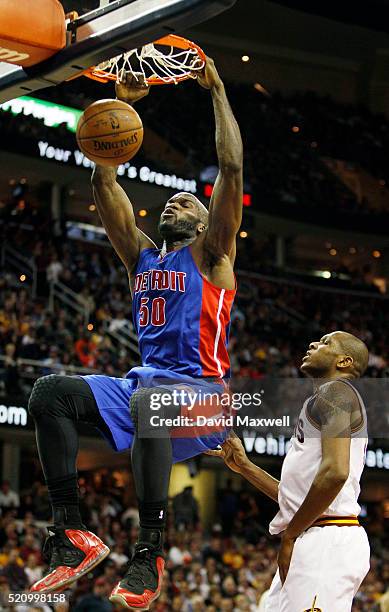 Joel Anthony of the Detroit Pistons dunks over James Jones of the Cleveland Cavaliers during the first half at Quicken Loans Arena on April 13, 2016...