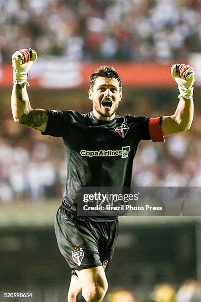 Denis of Sao Paulo celebrates the opening goal scored by his teammate Jonathan Calleri during a match between Sao Paulo and River Plate as part of...