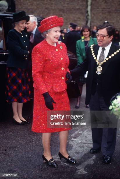 Queen Visiting Almshouses In Westminster, London Is Greeted By The Mayor In His Gold Chain Of Office. Behind The Queen At Left Is Lady In Waiting...