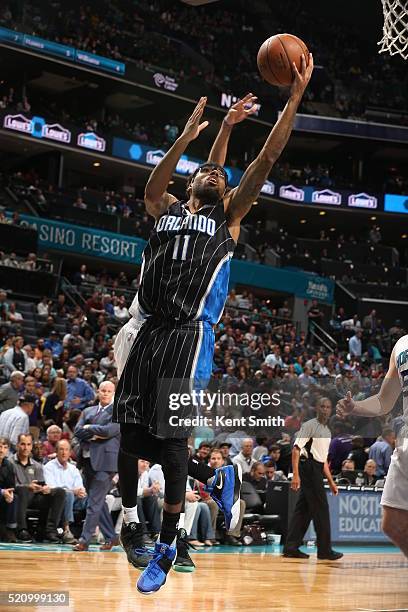 Devyn Marble of the Orlando Magic shoots the ball against the Charlotte Hornets on April 13, 2016 at Time Warner Cable Arena in Charlotte, North...