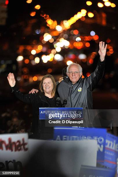 Democratic presidential candidate U.S. Senator Bernie Sanders and wife Jane Sanders wave to supporters at a campaign event at Washington Square Park...