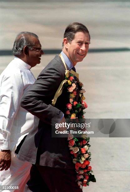 Prince Charles Arriving At Bandaranaike Airport In Colombo, Sri Lanka, Wearing A Garland Of Flowers.
