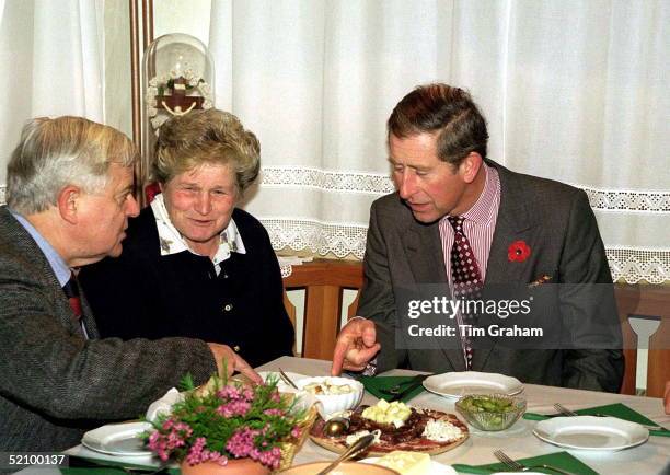 Prince Charles And President Milan Kucan Of Slovenia Sample Some Local Food At Pozrv Farm, Slovenia.