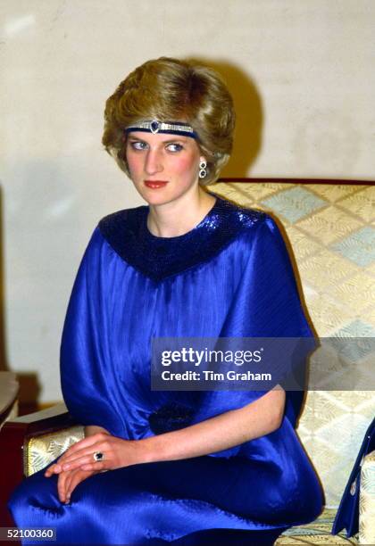 Diana, Princess Of Wales At A Dinner Hosted By Emperor Hirohito In Japan. She Is Wearing A Pleated Royal Blue Evening Dress Designed By Fashion...