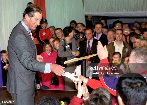 Prince Charles In Sheffield Handing Out Birthday Cake To Young People Involved With His Prince's Trust Charity.