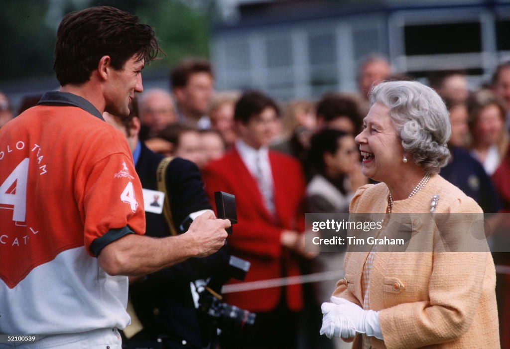 Queen Presenting A Prize