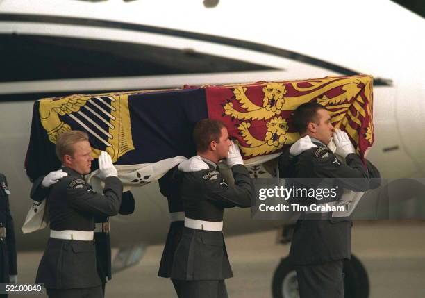 The Coffin Of Diana, Princess Of Wales, Being Carried From The Airplane At Raf Northolt Draped In Her Own Royal Standard Flag.