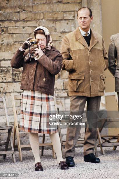 The Queen With Prince Philip Photographing A Horse At The Badminton Horse Trials