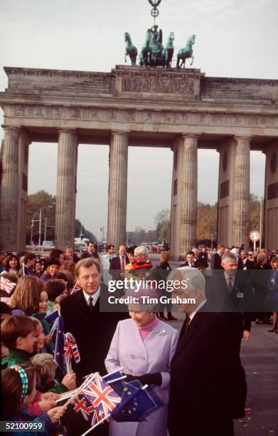 The Queen Visiting The Brandenburg Gate During An Official Tour Of Germany. She Is With President Richard Von Weizsaecker Meeting Crowds Waving Union...