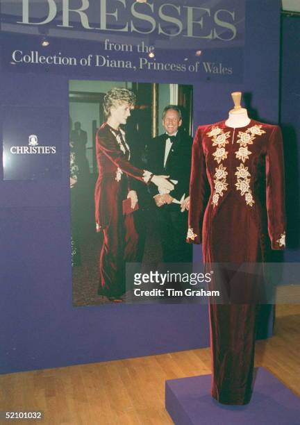 Burgundy Velvet With Gold Embroidery Dress From The Christie's Diana Dresses Auction On Display In London