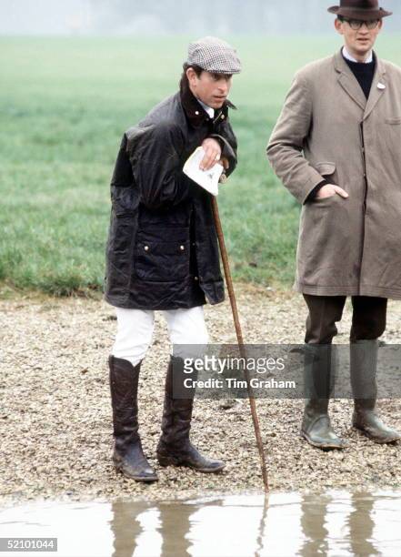 Prince Charles At Cross Country Hunt Event In Cirencester Wearing Green Barbour Style Jacket And Flat Cap.