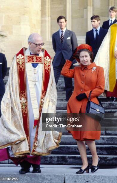 The Queen Walking Down The Steps Of St George's Chapel With The Right Reverend Michael Mann, Dean Of Windsor, After Attending Christmas Service....