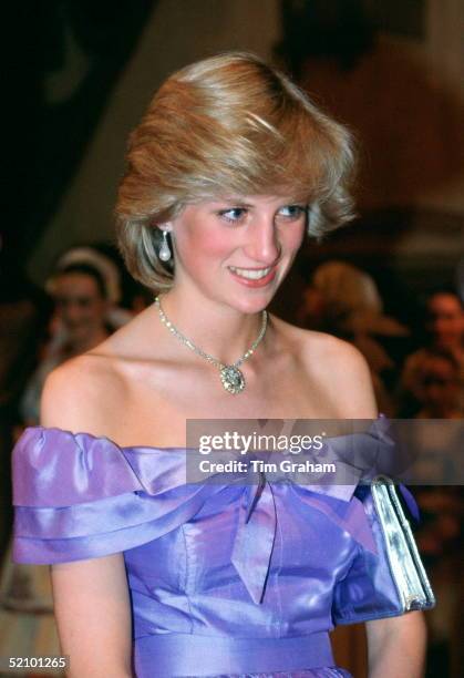 Diana, Princess Of Wales, Attendng The Ballet "coppelia" During Her Official Tour Of New Zealand. The Princess Is Wearing A Mauve Evening Dress...