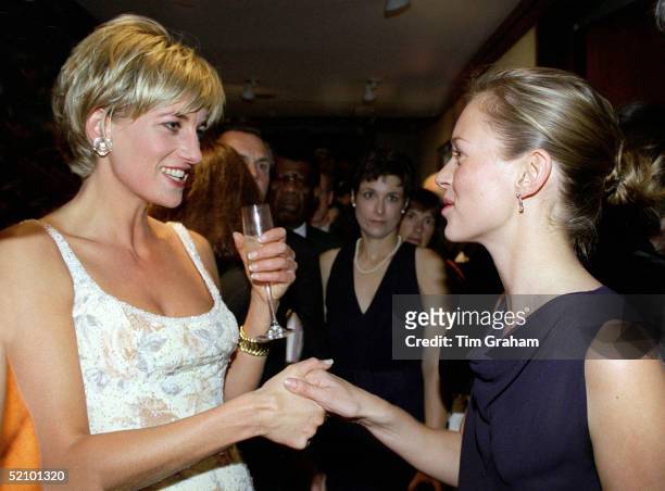 Diana, Princess Of Wales, Meeting Supermodel Kate Moss At The Pre-auction Party At Christies, New York. She Is Wearing A Dress By Fashion Designer...