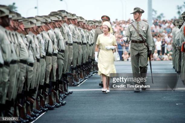 The Queen Reviewing Troops On Her Arrival In Brisbane, Australia During Her Jubilee Tour In February & March 1977