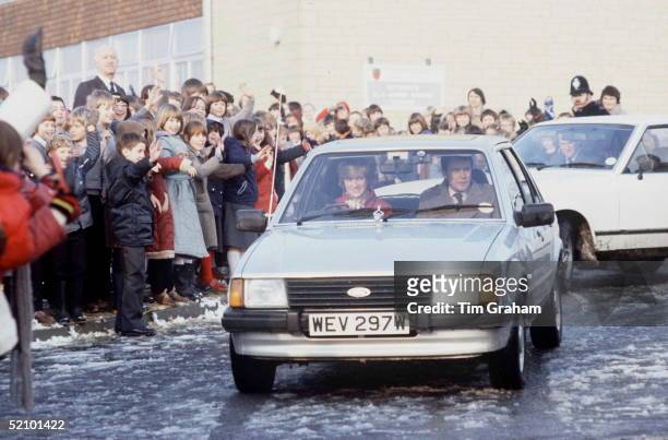 Princess Diana Driving Her Ford Escort Car On A Visit To St Mary's School In Tetbury. In The Passenger Seat Is Her Police Bodyguard Graham Smith