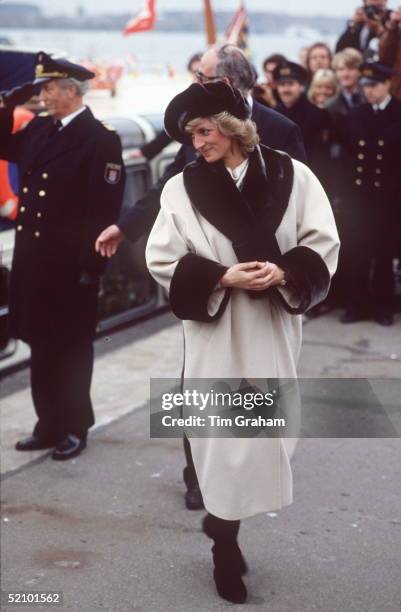 Princess Diana In Hamburg Wearing A Coat Designed By Arabella Pollen With A Fake Fur Trim On Collar And Cuffs And A Fake Fur Beret Style Hat