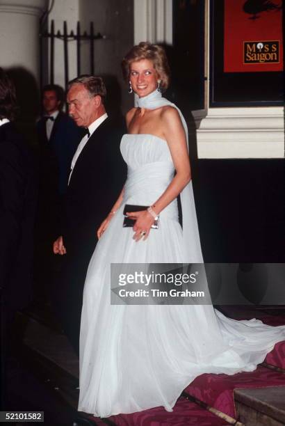 Princess Diana Arrives At The Theatre Royal Drury Lane London For A Performance Of The Musical "miss Saigon" Wearing A Pale Blue Chiffon Evening...