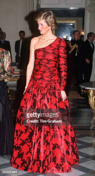 Princess Diana In Paris In Red And Black One-shouldered Evening Dress Designed By Fashion Designer Catherine Walker At A Dinner Given By The British...