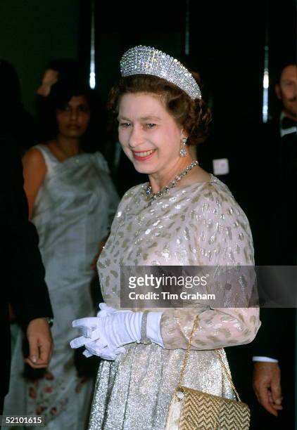 Queen Elizabeth Ll At A State Banquet Wearing An Evening Dress Designed By Fashion Designer Sir Hardy Amies With The Kokoshnick Tiara And Queen...