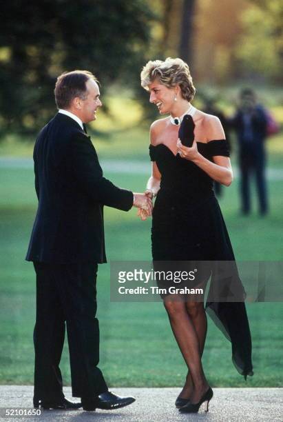 Princess Diana Wearing A Short Black Dress Designed By Christina Stambolian For A Gala At The Serpentine Gallery In London. She Is Being Greeted By...
