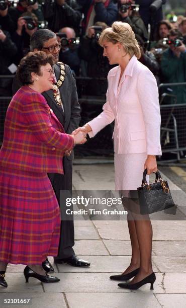 Diana, Princess Of Wales Shaking Hands As She Arrives At The National Hospital For Neurology And Neurosurgery In London. The Princess Is Wearing A...