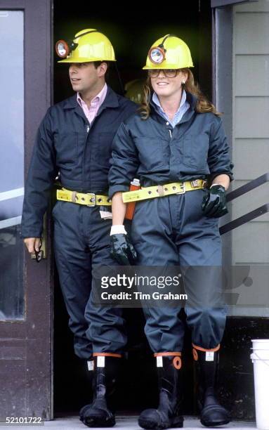 Prince Andrew, Duke Of York And Sarah Duchess Of York Wearing Builder's Hard Hats And Overalls While Visiting The Giant Yellowknife Mines In Canada