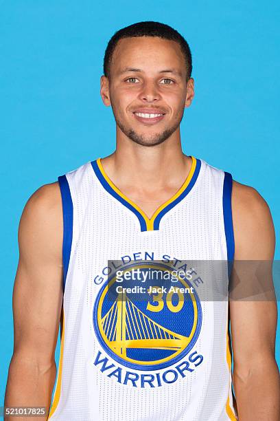 Stephen Curry of the Golden State Warriors poses for a photo during Media Day on September 29, 2014 at the Warriors practice facility in Oakland,...