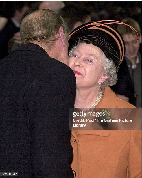 Millennium Celebrations In London. The Queen And Prince Philip Kissing At Midnight In The Millennium Dome On The Eve Of The New Millennium.