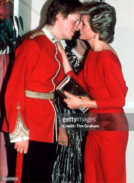 Princess Diana Kissing Her Brother, Viscount Althorp At The Birthright Red Ball In London Raising Funds For The Charity Birthright Of Which She Is...