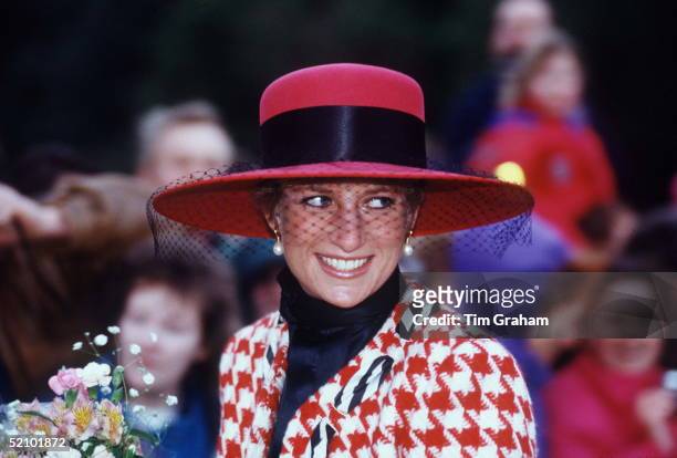 Diana, Princess Of Wales, Smiling On A Walkabout After Attending Christening Service At Sandringham Church. The Princess Is Wearing A Houndstooth Red...